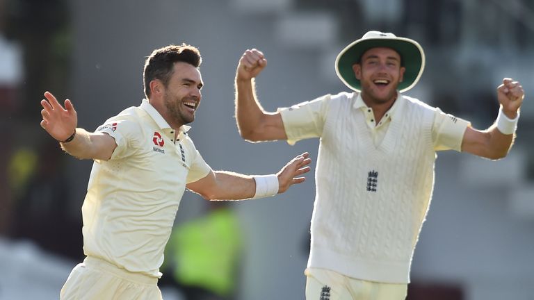 Stuart Broad (right) celebrates Anderson's 500th Test wicket