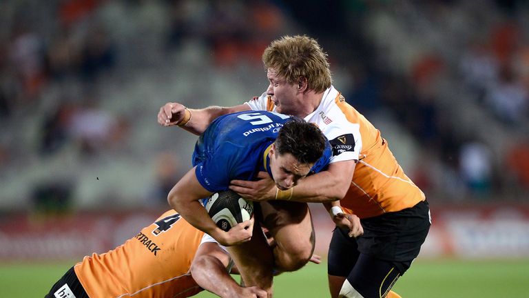 Joey Carbery is wrapped up by the Cheetahs defence