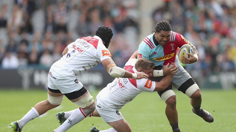 Harlequins' Mathew Luamanu battles with Tom Youngs and Sione Kalamafoni 