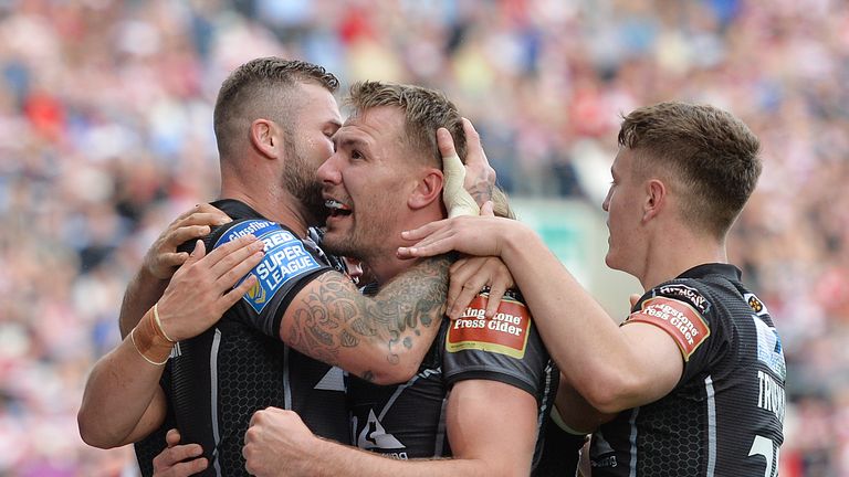 Castleford's Michael Shenton is congratulated by team-mates after scoring