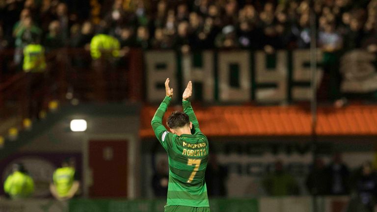 The returning Patrick Roberts applauds the travelling support as he's replaced
