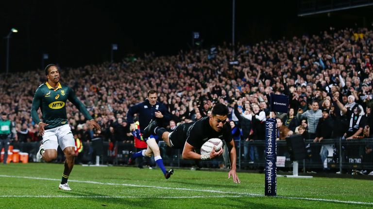 Rieko Ioane of the All Blacks scores a try against South Africa