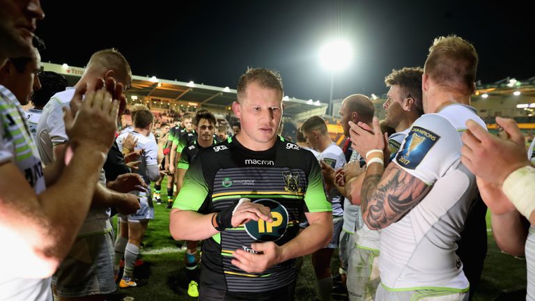 Northampton skipper Dylan Hatley leads his team off