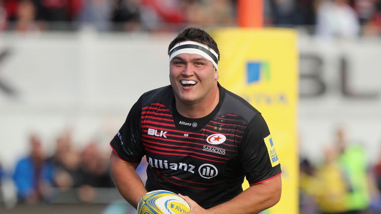 Jamie George of Saracens celebrates his second of three tries at Allianz Park