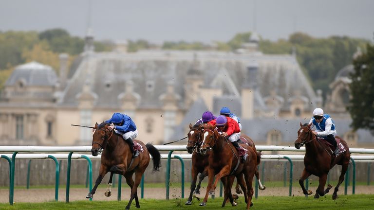 Wild Illusion (L, blue) win the Total Prix Marcel Boussac - Criterium Des Pouliches at Chantilly