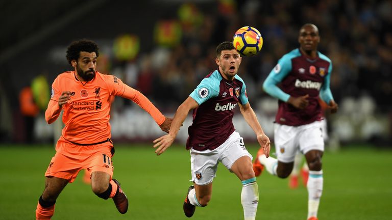 Liverpool's Mohamed Salah makes the starting XI down the right flank