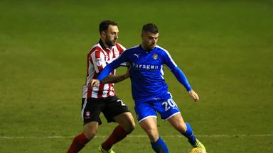 Lincoln secured top spot with in Group G with a 2-1 victory over Notts County
