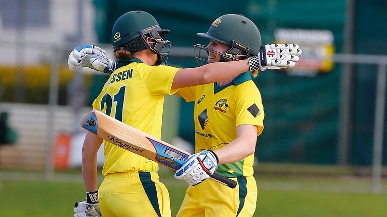 Jess Jonassen and Blackwell embrace after Australia's win over England in Brisbane