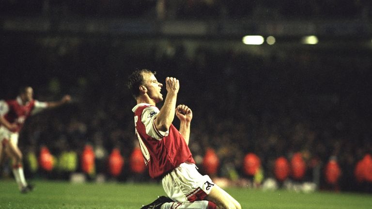 Dennis Bergkamp celebrates against Tottenham
