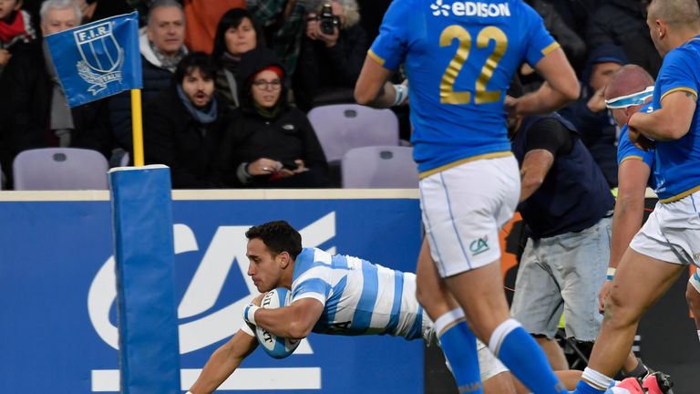 Argentina's full-back Joaquin Tuculet goes over for a try in Florence