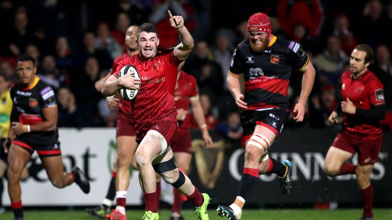 Sam Arnold notched twice as Munster put seven tries past the Dragons 