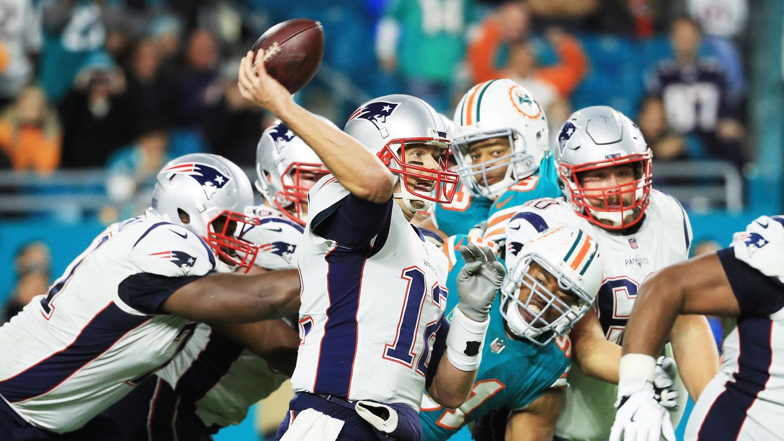 Brady intercepted twice as Dolphins beat Pats, 27-20