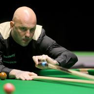 Mark King won four of the last five frames to defeat John Higgins