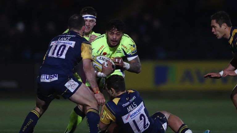 Sale's Denny Solomona is tackled by Ryan Mills of Worcester 