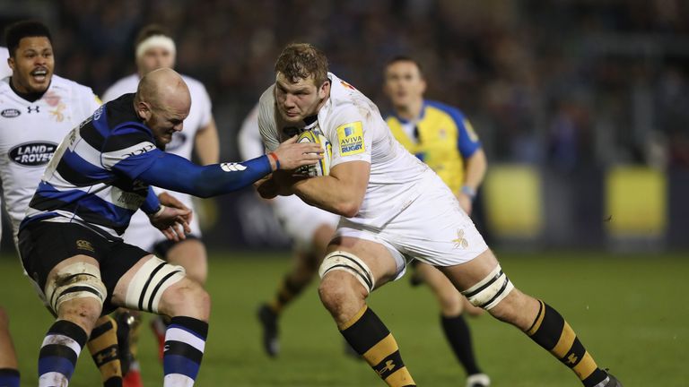 Joe Launchbury takes on Bath's Matt Garvey 