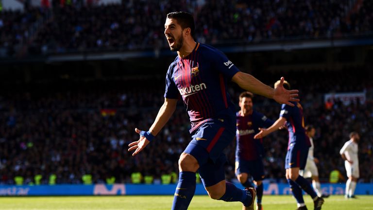 Luis Suarez scored Barcelona's first goal in their 3-0 win at Real Madrid