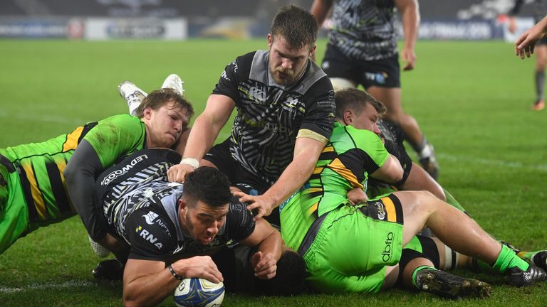 Rhys Webb dives over to score his second Ospreys' try against Northampton