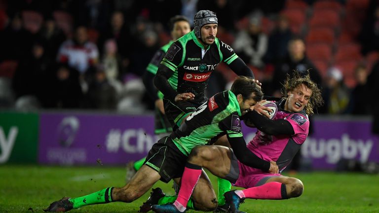 Billy Twelvetrees is hit hard by Conrad Smith