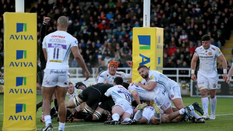 Kyle Cooper scored under a sea of bodies in the last minute of the first half for Newcastle's third try 