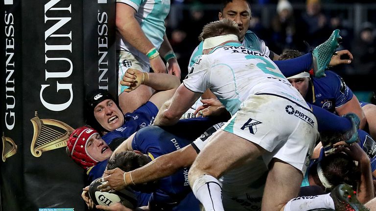 Luke McGrath dives over for Leinster's second try from close range 