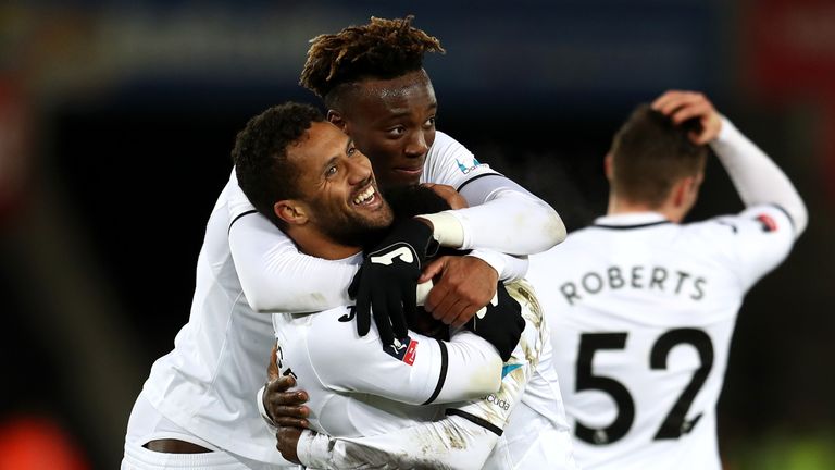 Wayne Routledge celebrates scoring the sixth Swansea goal with Tammy Abraham
