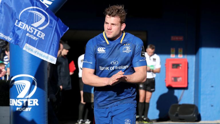 Jordi Murphy runs onto the pitch on the occasion of his 100th appearance for Leinster Rugby