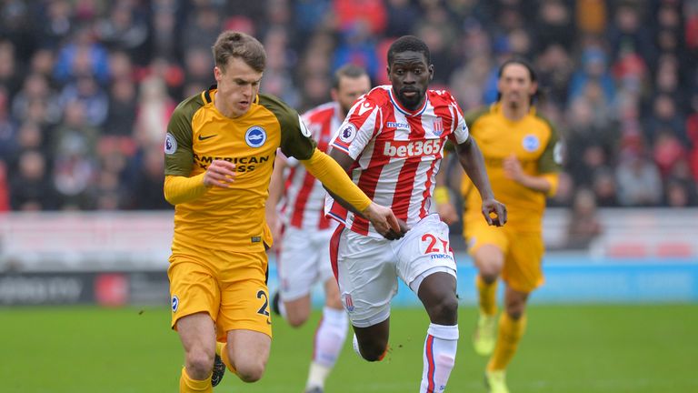 Solly March is chased down by Badou Ndiaye (right) at the bet365