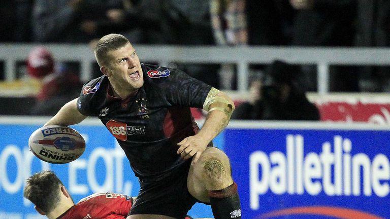 Wigans Tony Clubb celebrates scoreing a try