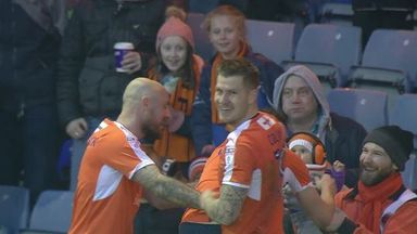 Image of Danny Hylton celebrates his opener during Luton's 2-0 win over Barnet with eight-month old baby Beatrix