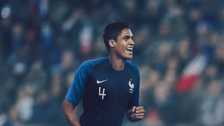 Raphael Varane models France's kit for the 2018 World Cup