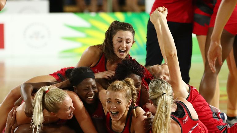 A jubilant Roses squad celebrate their first major medal at world level