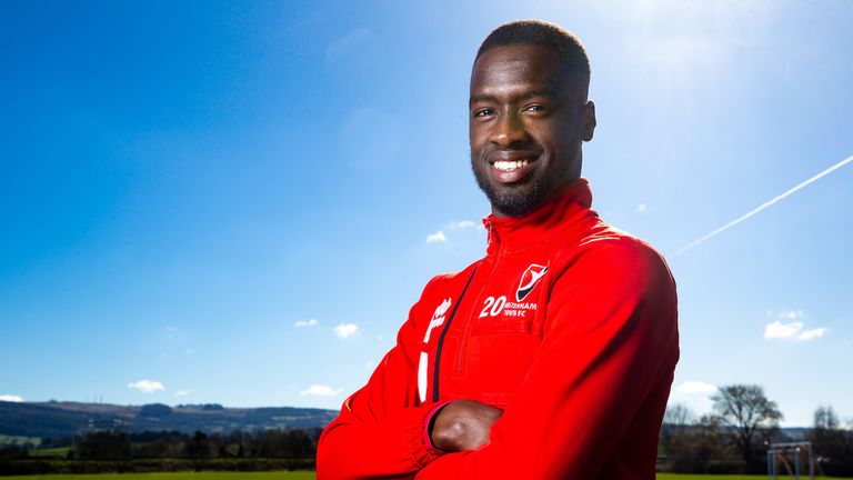 Mohamed Eisa of Cheltenham is presented with the Sky Bet League Two Player of the Month Award for March