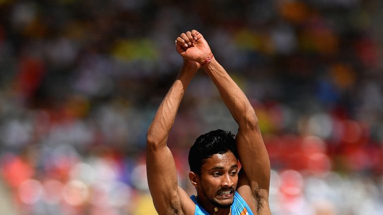 Rakesh Babu competing in the men's triple jump qualification