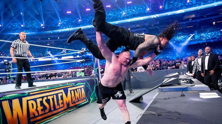 Reigns took several F5s from Lesnar at WrestleMania - including one through an announce table