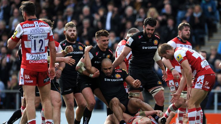 Olly Woodburn is picked up by Slade after scoring Exeter's third try