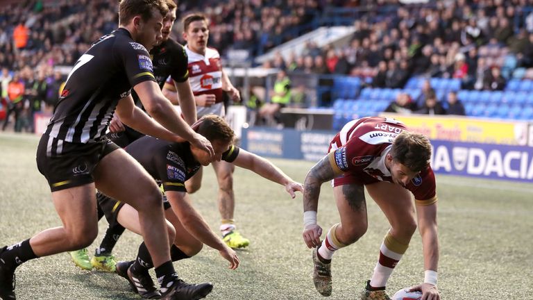 Wigan's Oliver Gildart scores his side's first try