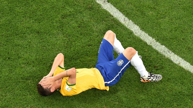 Oscar reacts after Brazil's 7-1 defeat to Germany in 2014
