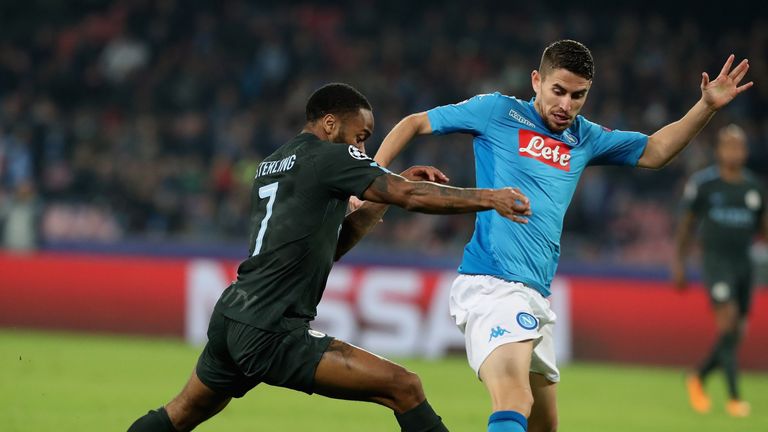 Jorginho battles with Manchester City's Raheem Sterling