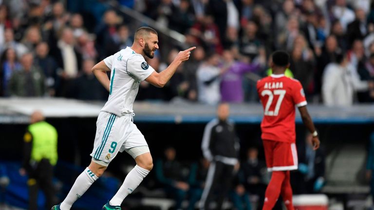 Benzema celebrates his leveller on the night
