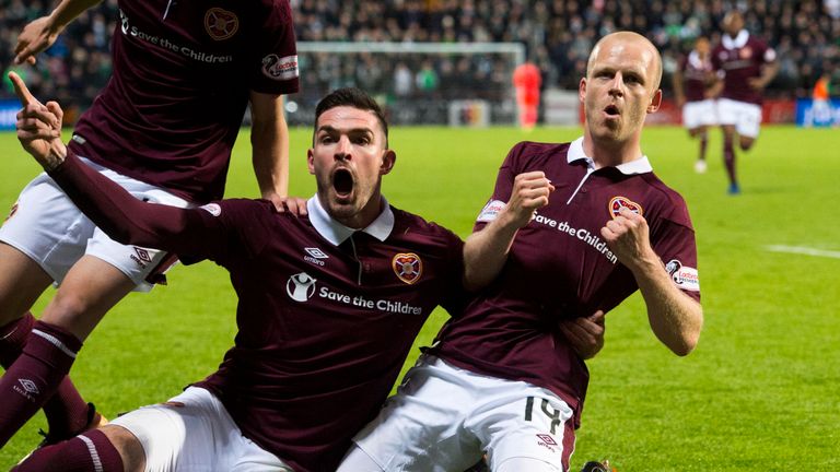 Kyle Lafferty (L) has played for Hearts since 2017 and has scored 12 goals
