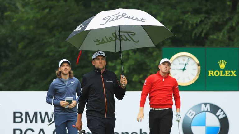 Ian Poulter, Tommy Fleetwood and Matt Wallace had to deal with the early morning rain