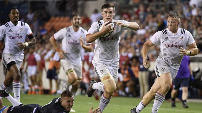 USA outside half AJ Macginty escapes the tackle of Scotland No 8 Matt Fagerson during the second half in Houston