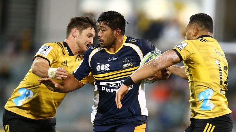 Folau Fainga'a takes on the Hurricanes defence