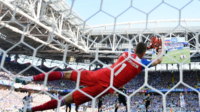 Hannes Halldorsson saves Lionel Messi's penalty