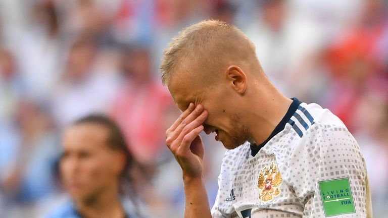Igor Smolnikov reacts to being sent off