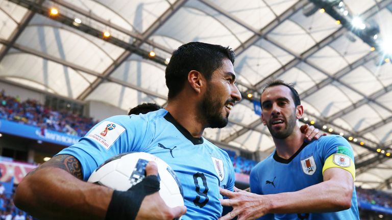 Luis Suarez celebrates after scoring his team's first goal