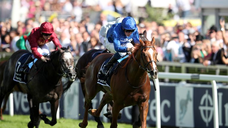 Masar ridden by jockey William Buick coming home to win the Investec Derby