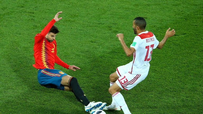 Gerard Pique launches into a two-footed tackle