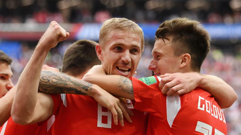 Yury Gazinsky celebrates his goal with team-mates
