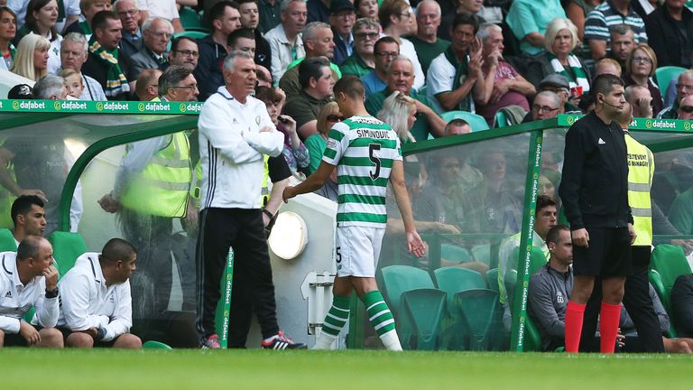 Jozo Simunovic walks off the pitch after being red carded
